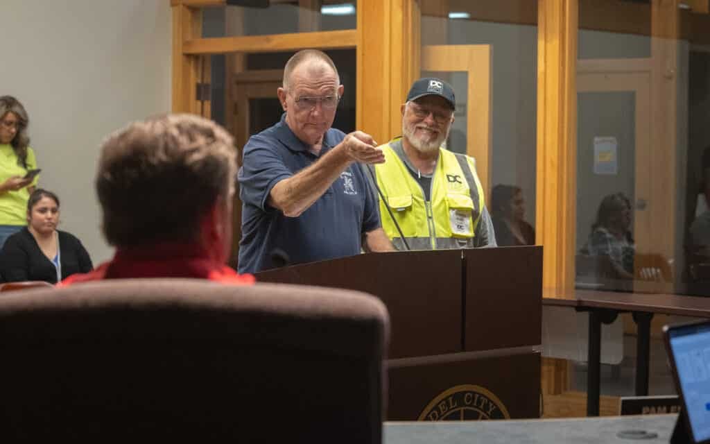 Del City community member at the council podium in City Hall.