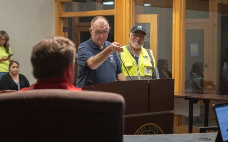 Del City community member at the council podium in City Hall.